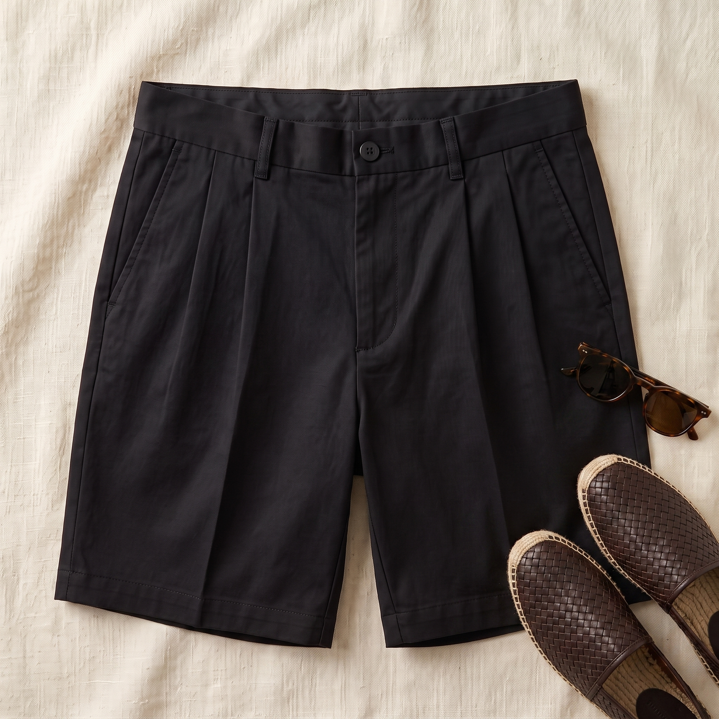 Windsor Pleated Shorts - styled flat lay