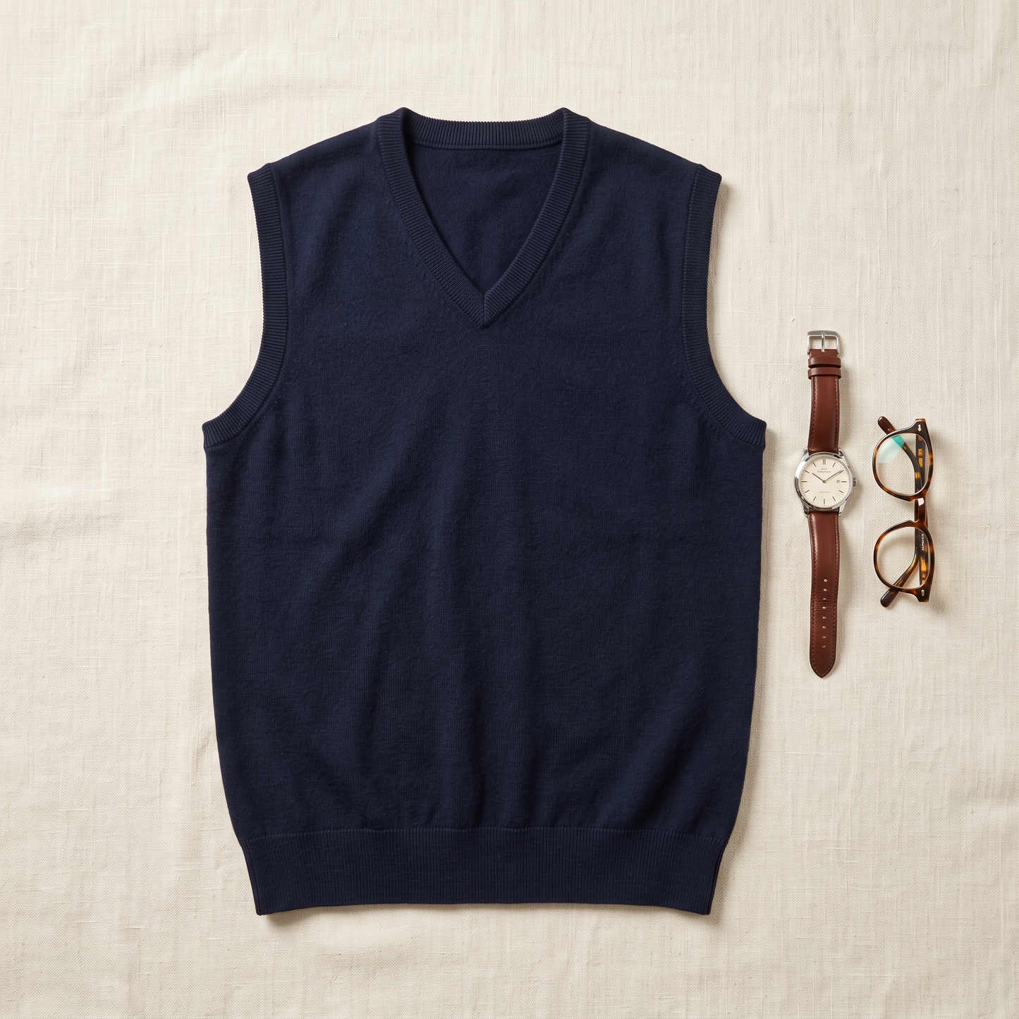 Bellagio Merino Sweater Vest - styled flat lay