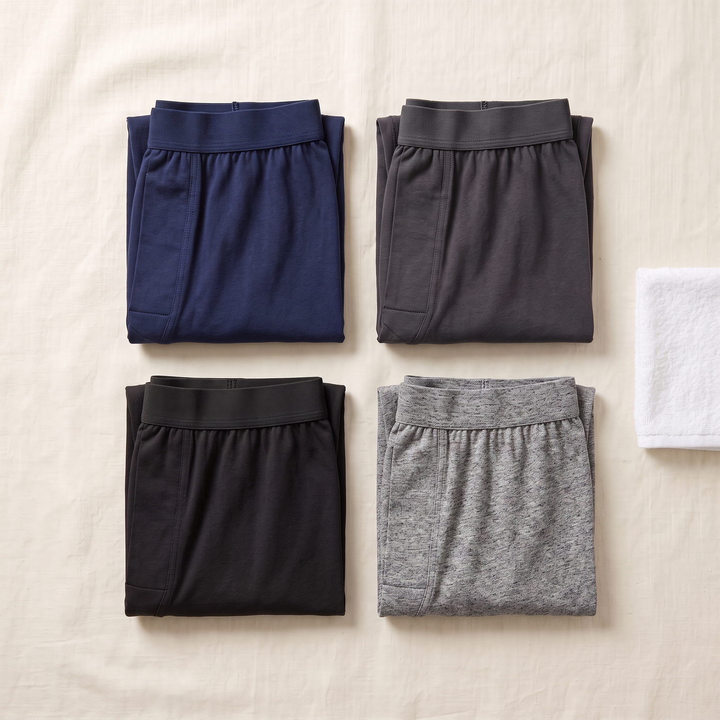 Essentials 4-Pack Boxers - styled flat lay